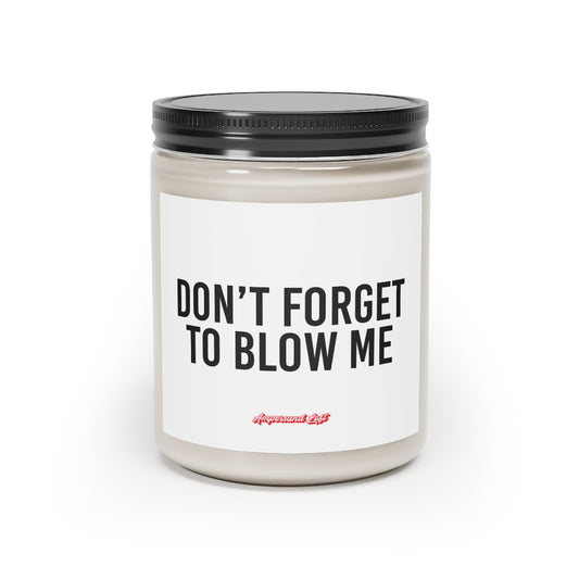 Candle in a glass jar with black label that reads, in white All-Caps text "Don't Forget to Blow Me." and a small "Ampersand Loft logo below (pink retro font with solid red drop shadow)
